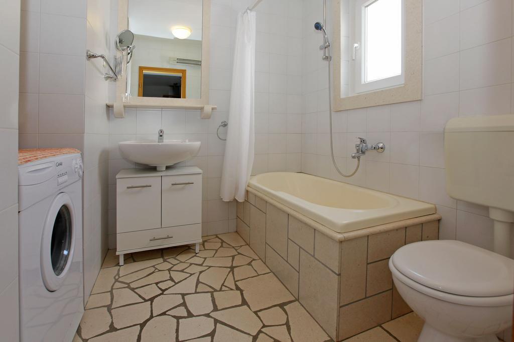 Apartments Mel Бол Стая снимка